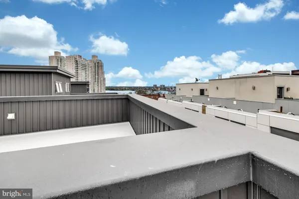 a terrace with a city view