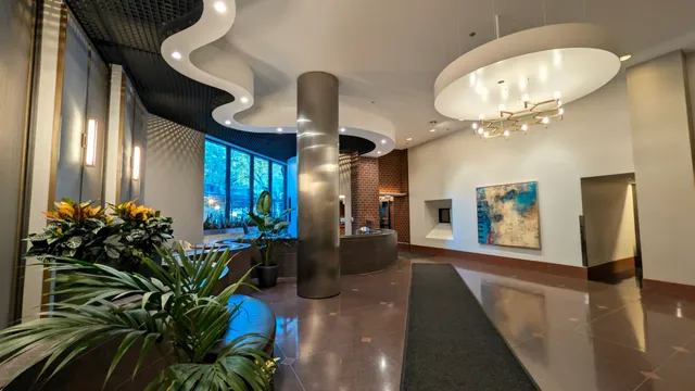 an entryway and a livingroom with furniture