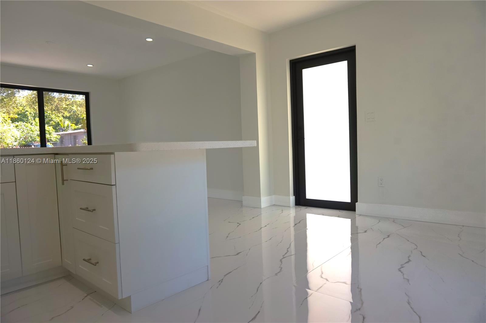 53 Northwest 68th Street Miami, FL 33150 - Photo 13 of 47 Side door.