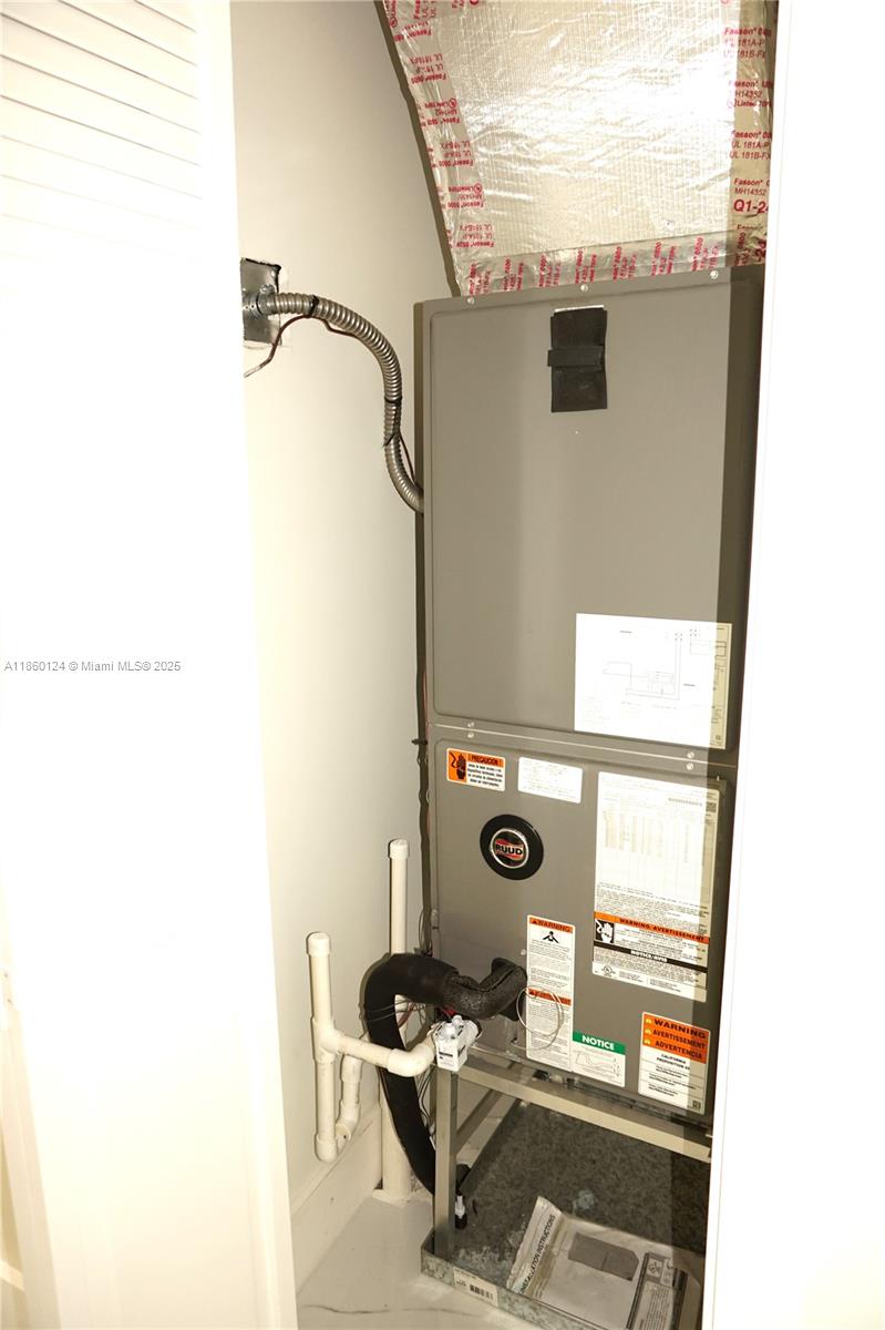 53 Northwest 68th Street Miami, FL 33150 - Photo 27 of 47 A/C Closet on the Hallway