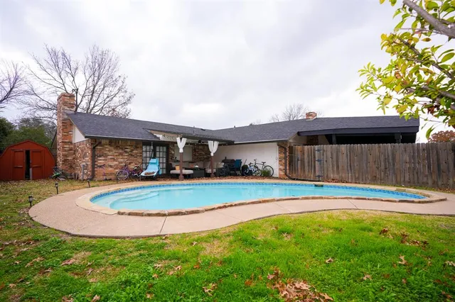 a view of outdoor space yard and swimming pool