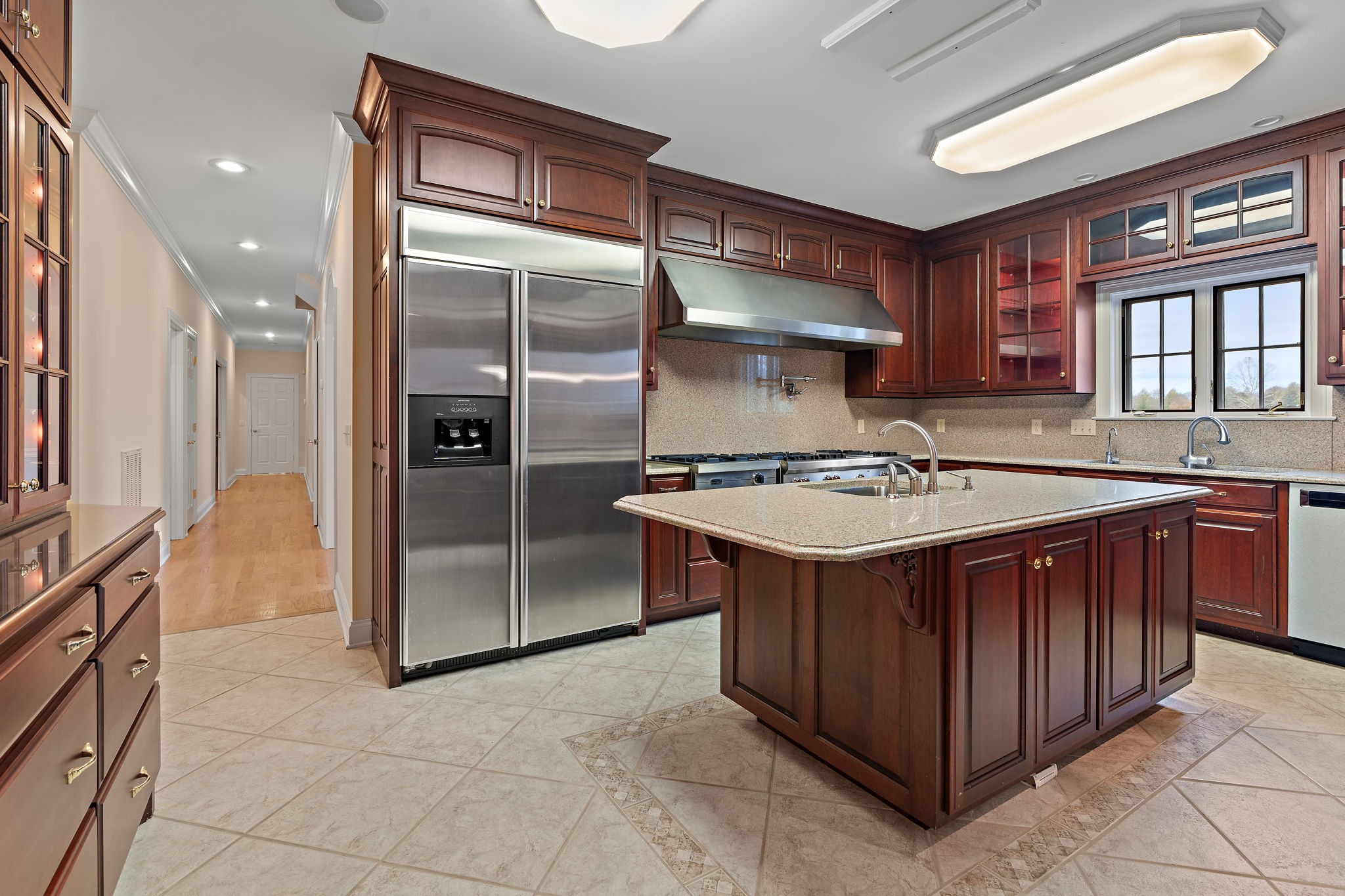 303 Middlefield Lane Lascassas, TN 37085 - Photo 15 of 49 a kitchen with a sink stove and refrigerator
