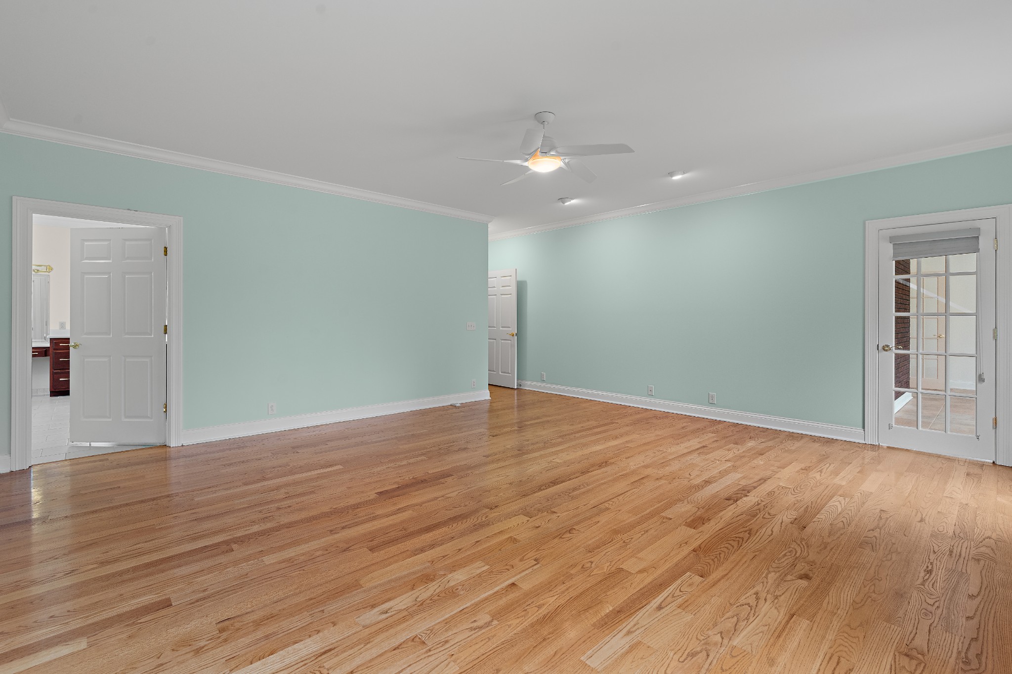 303 Middlefield Lane Lascassas, TN 37085 - Photo 20 of 49 a view of an empty room with wooden floor and windows