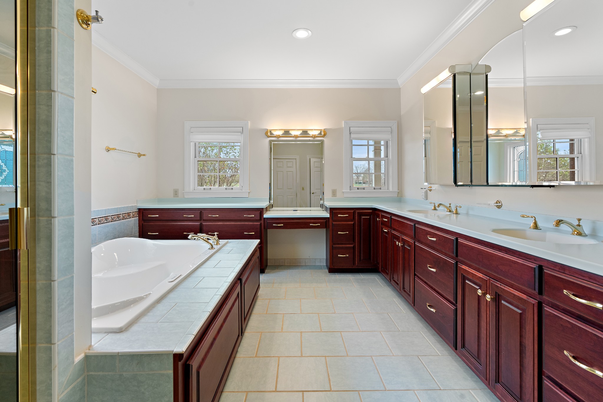 303 Middlefield Lane Lascassas, TN 37085 - Photo 21 of 49 a large bathroom with a double vanity sink large mirror and a bathtub