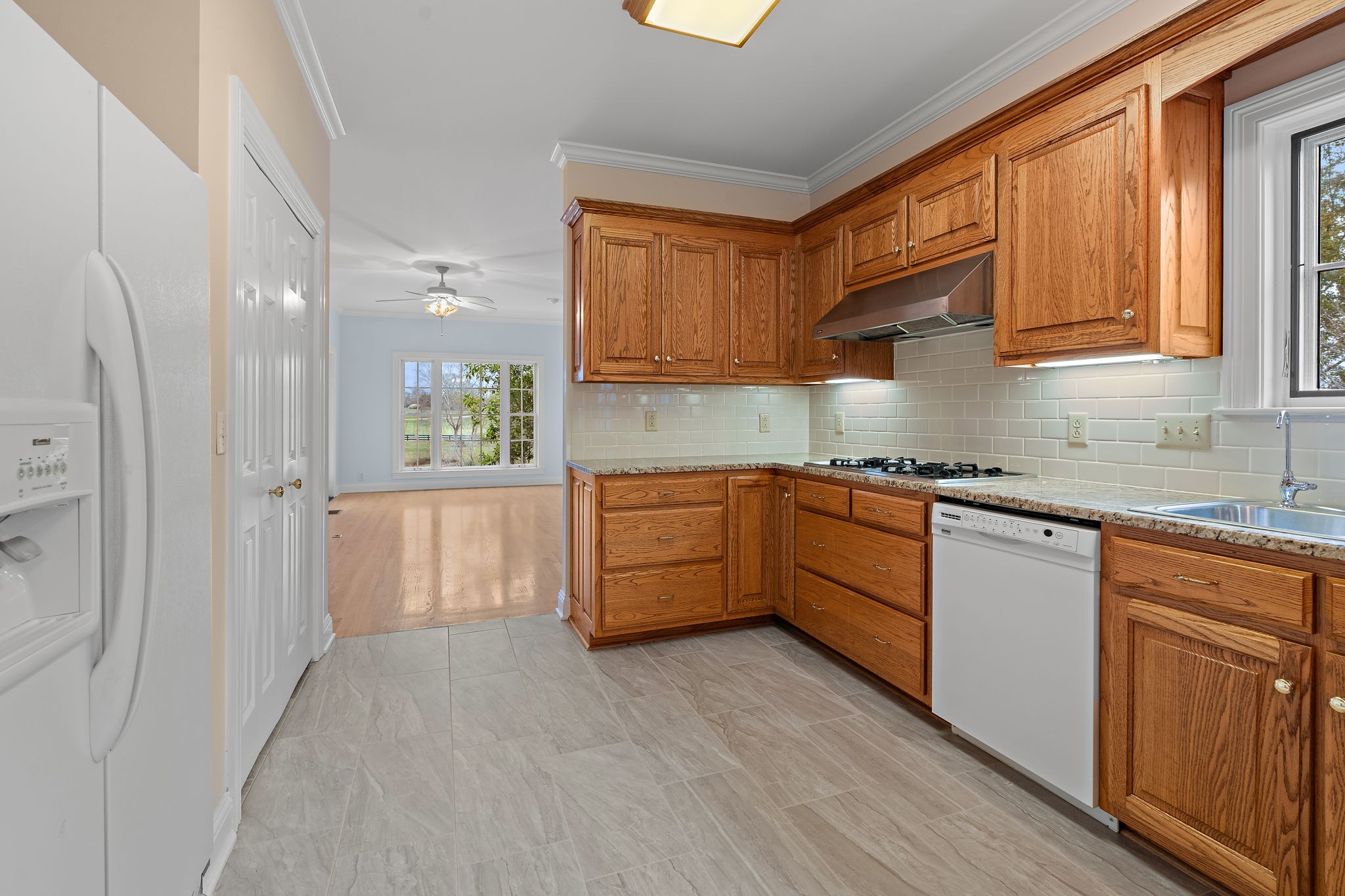 303 Middlefield Lane Lascassas, TN 37085 - Photo 25 of 49 a kitchen with stainless steel appliances granite countertop a stove a sink and a refrigerator