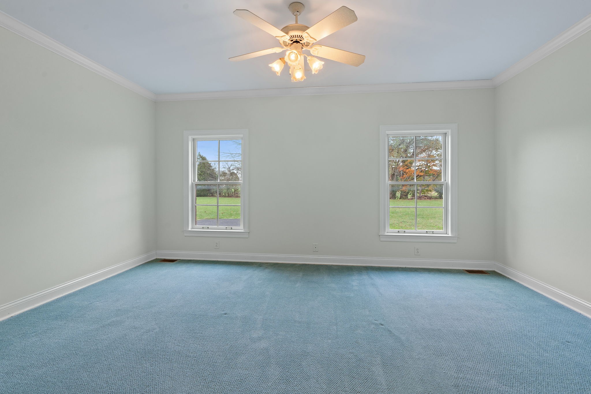 303 Middlefield Lane Lascassas, TN 37085 - Photo 27 of 49 an empty room with a window and a fan