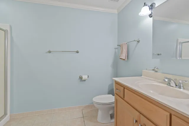 a bathroom with a sink toilet and vanity