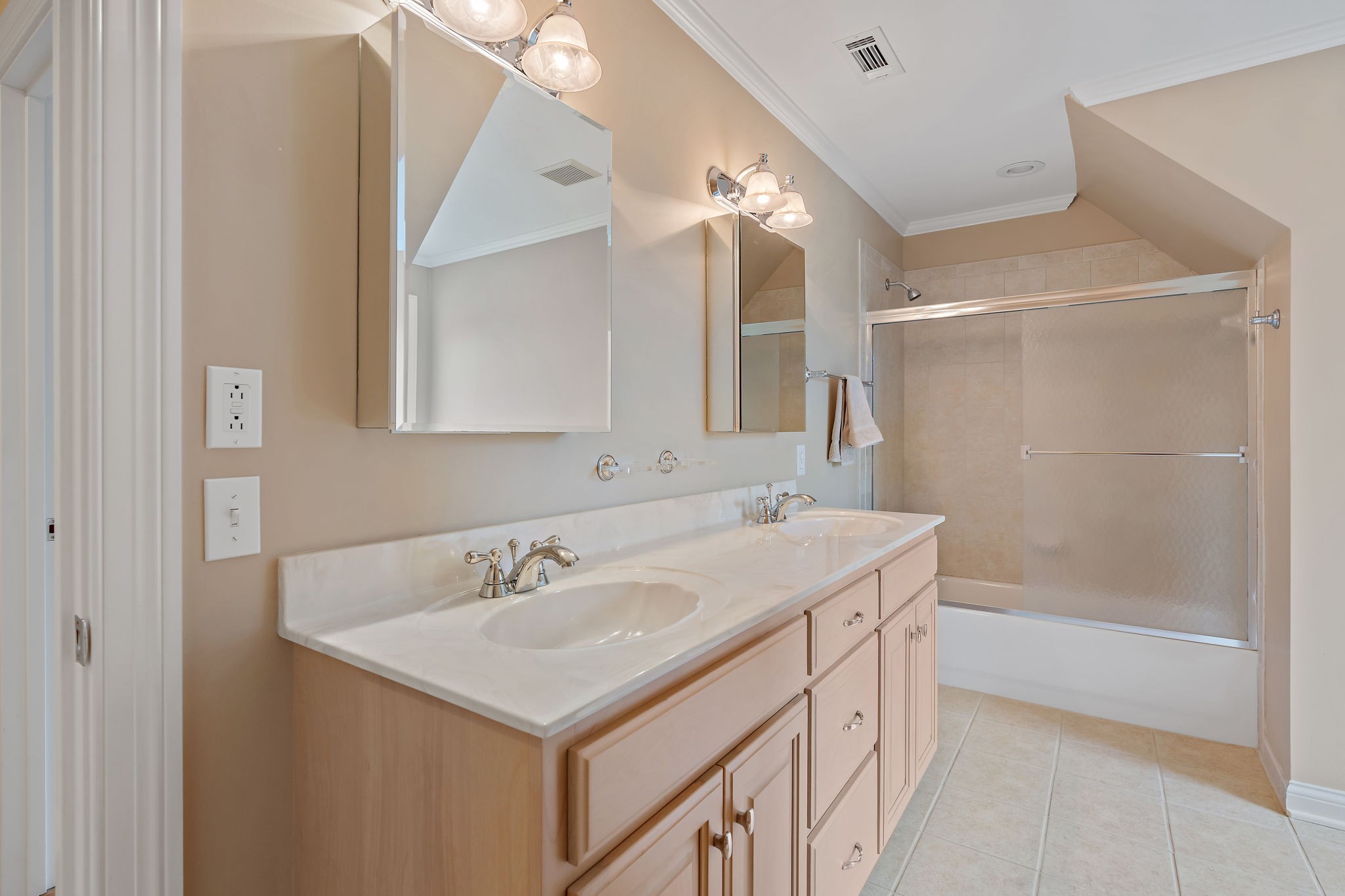 303 Middlefield Lane Lascassas, TN 37085 - Photo 40 of 49 a bathroom with a sink a vanity a mirror and a bathtub