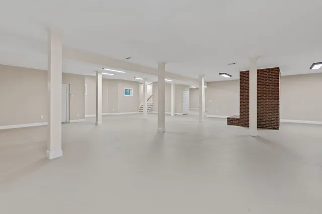 a bathroom with a sink toilet and vanity