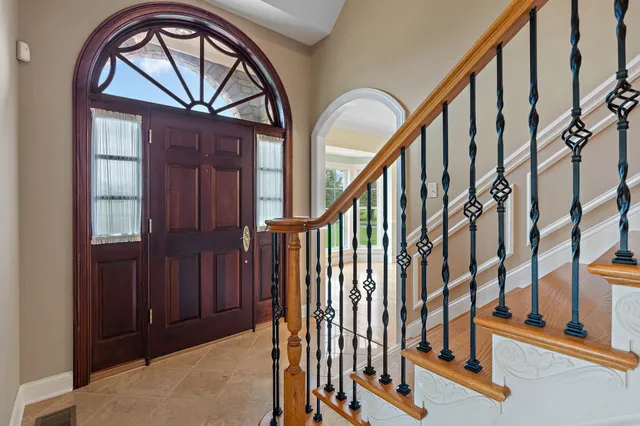 a view of an entryway with staircase