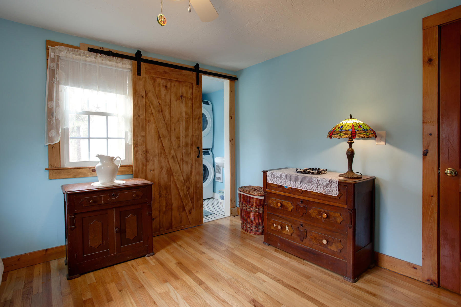 21 Naushon Road Dennis Port, MA 02639 - Photo 17 of 27 a bed room with a bed and a dresser