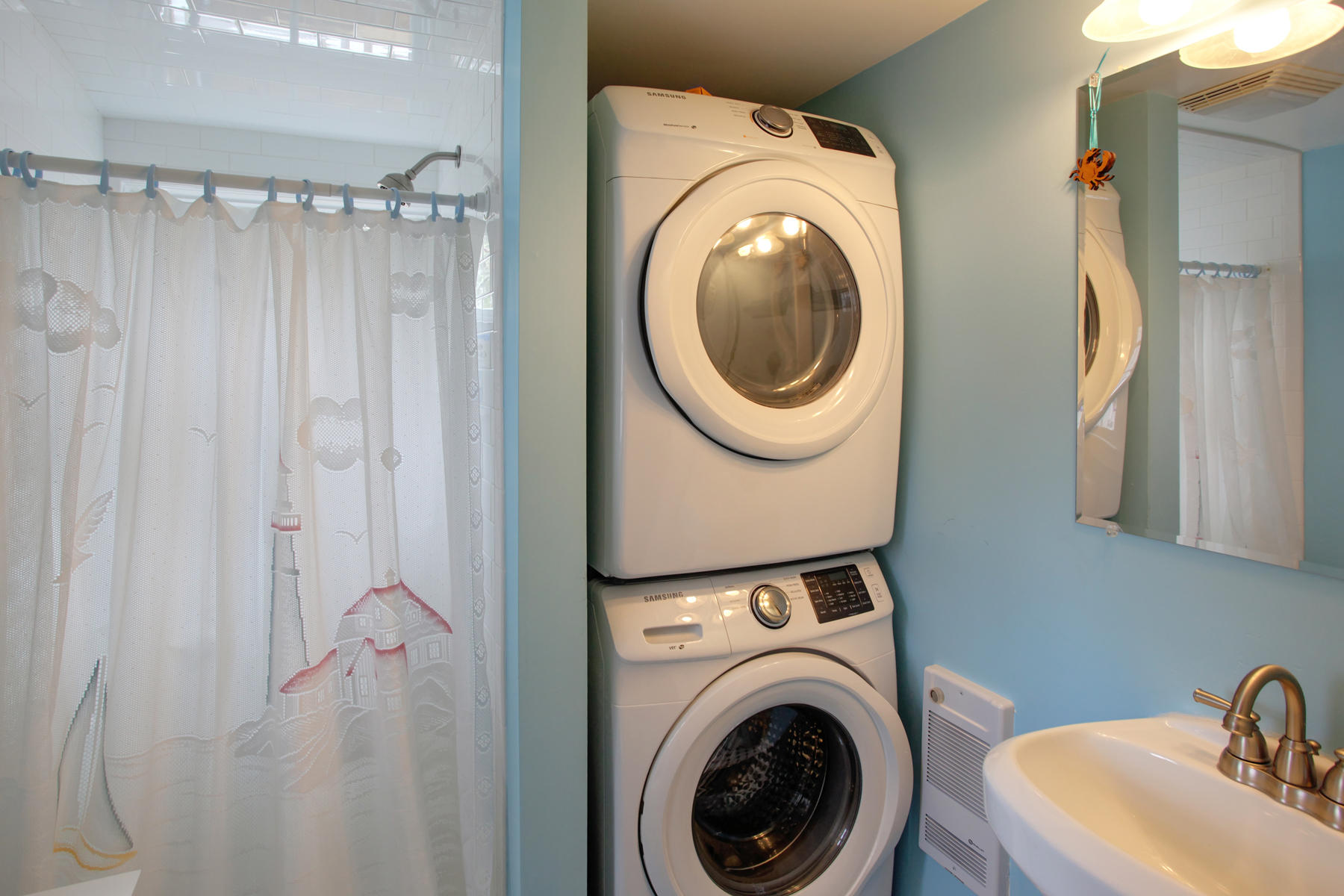 21 Naushon Road Dennis Port, MA 02639 - Photo 18 of 27 a utility room with dryer and washer