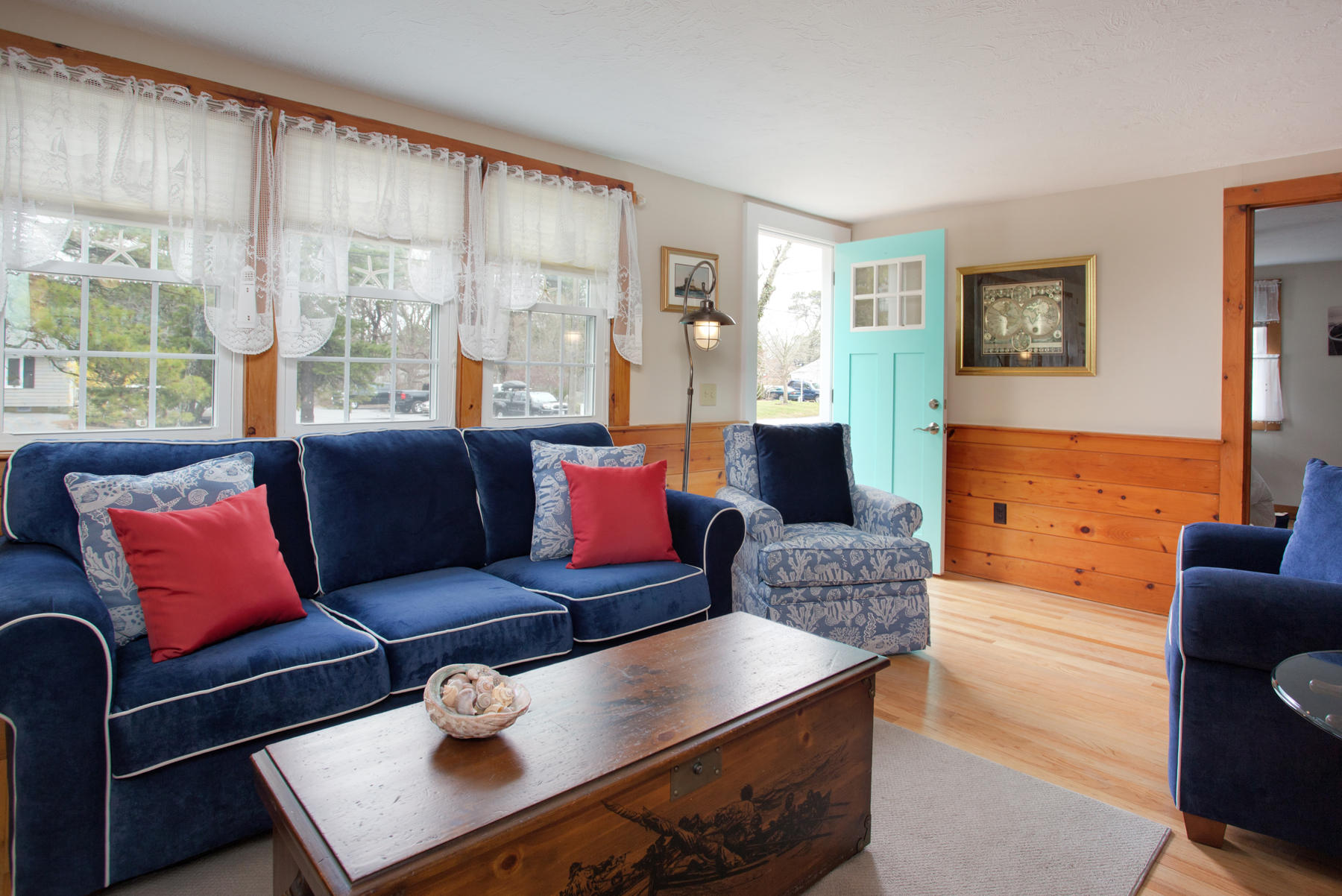 21 Naushon Road Dennis Port, MA 02639 - Photo 2 of 27 a living room with furniture and a large window