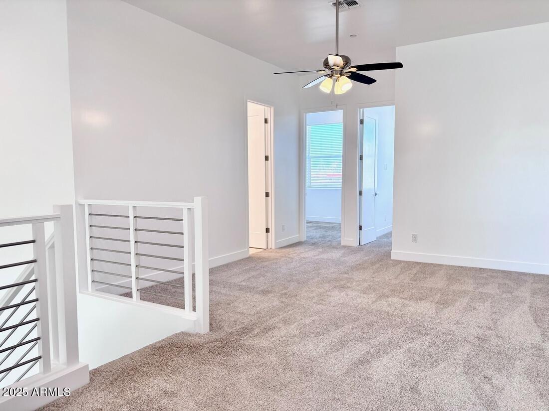 4050 North 12th Street, Unit 6 Phoenix, AZ 85014 - Photo 21 of 50 a view of a room with a ceiling fan