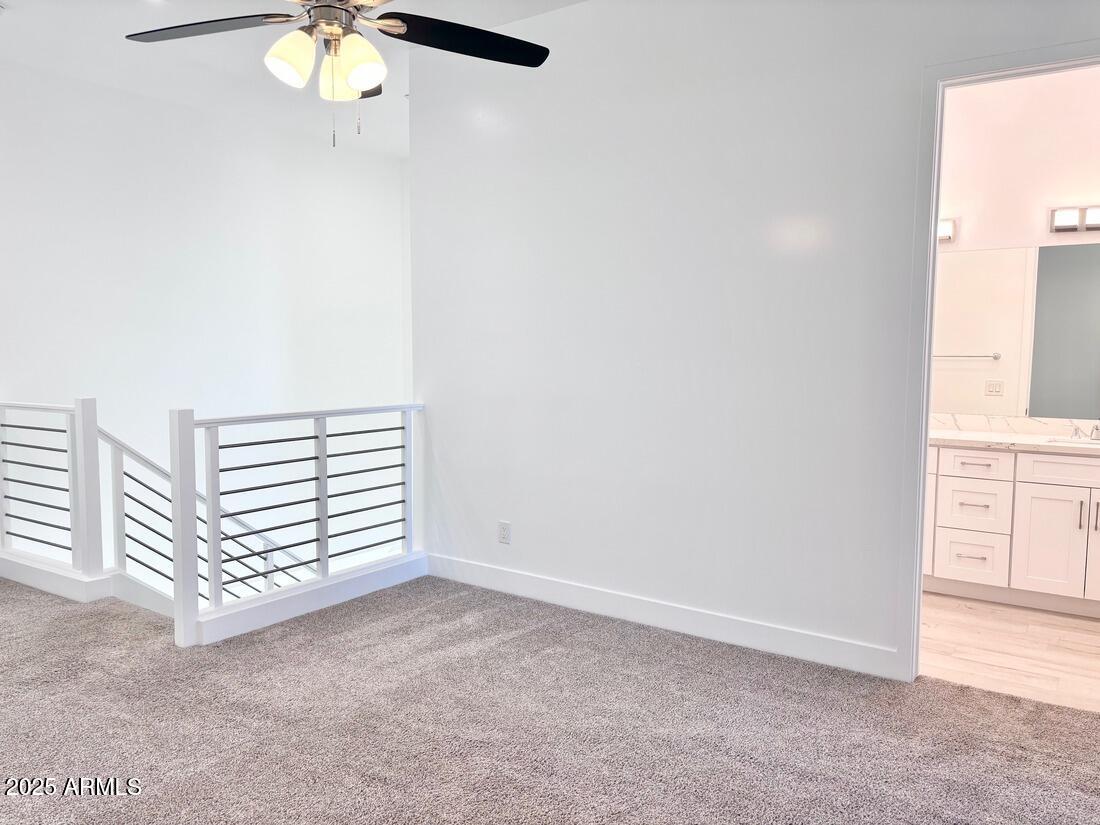 4050 North 12th Street, Unit 6 Phoenix, AZ 85014 - Photo 22 of 50 an empty room with windows