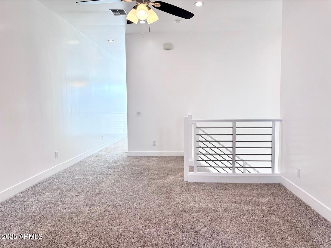 4050 North 12th Street, Unit 6 Phoenix, AZ 85014 - Photo 23 of 50 an empty room with a window