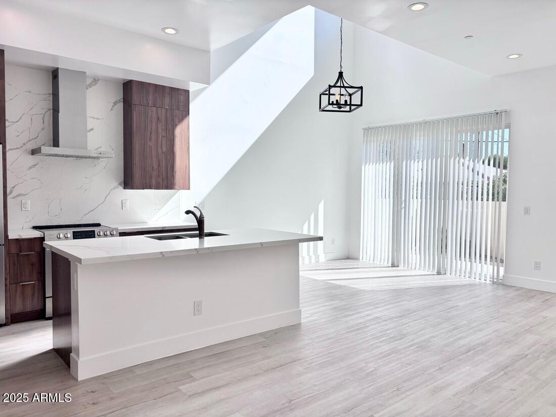 4050 North 12th Street, Unit 6 Phoenix, AZ 85014 - Photo 3 of 50 a view of an entryway with wooden floor