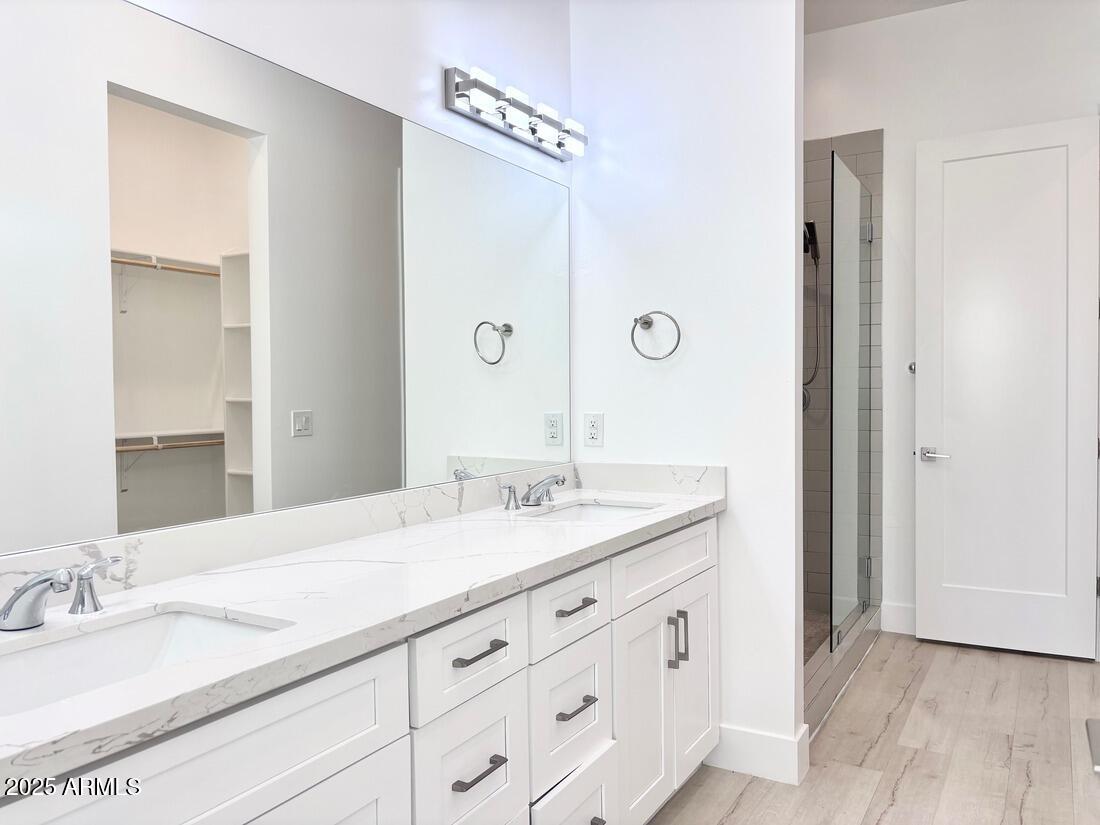 4050 North 12th Street, Unit 6 Phoenix, AZ 85014 - Photo 40 of 50 a bathroom with a granite countertop sink and a mirror