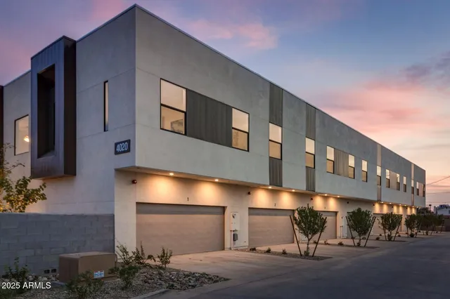 a view of a building with a street