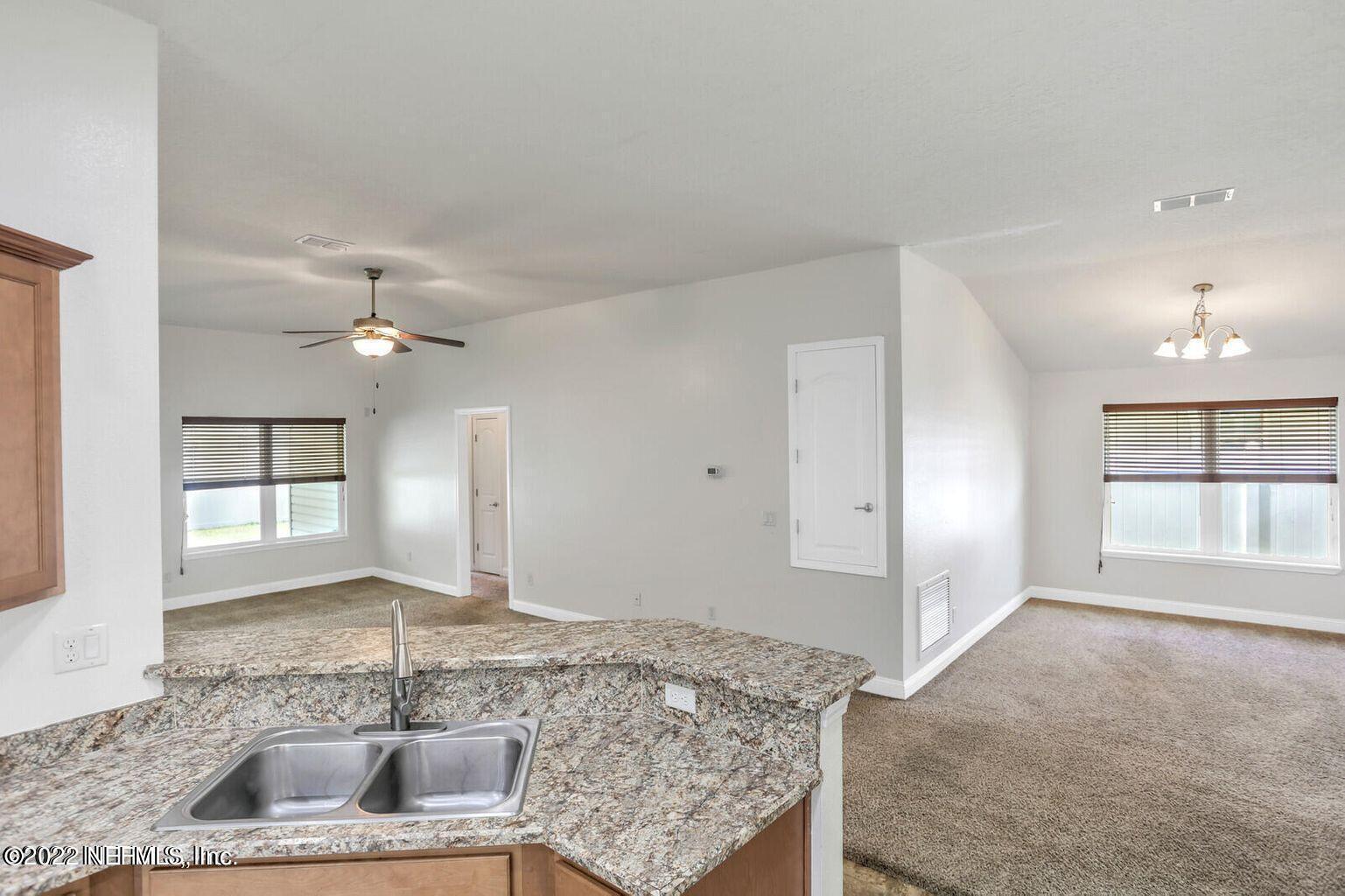 5816 Round Table Road Jacksonville, FL 32254 - Photo 4 of 11 living room and dining room