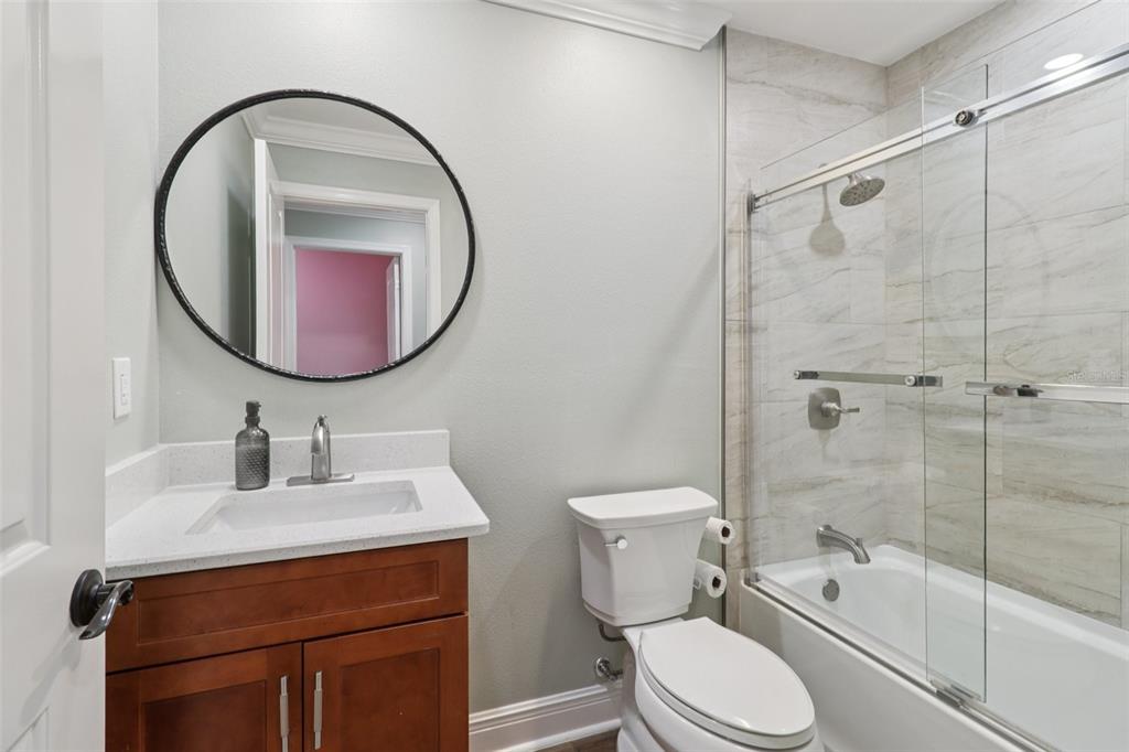 40535 Louise Road Umatilla, FL 32784 - Photo 20 of 38 a bathroom with a sink toilet and shower