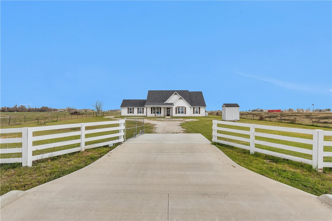 a view of a big room with wooden fence