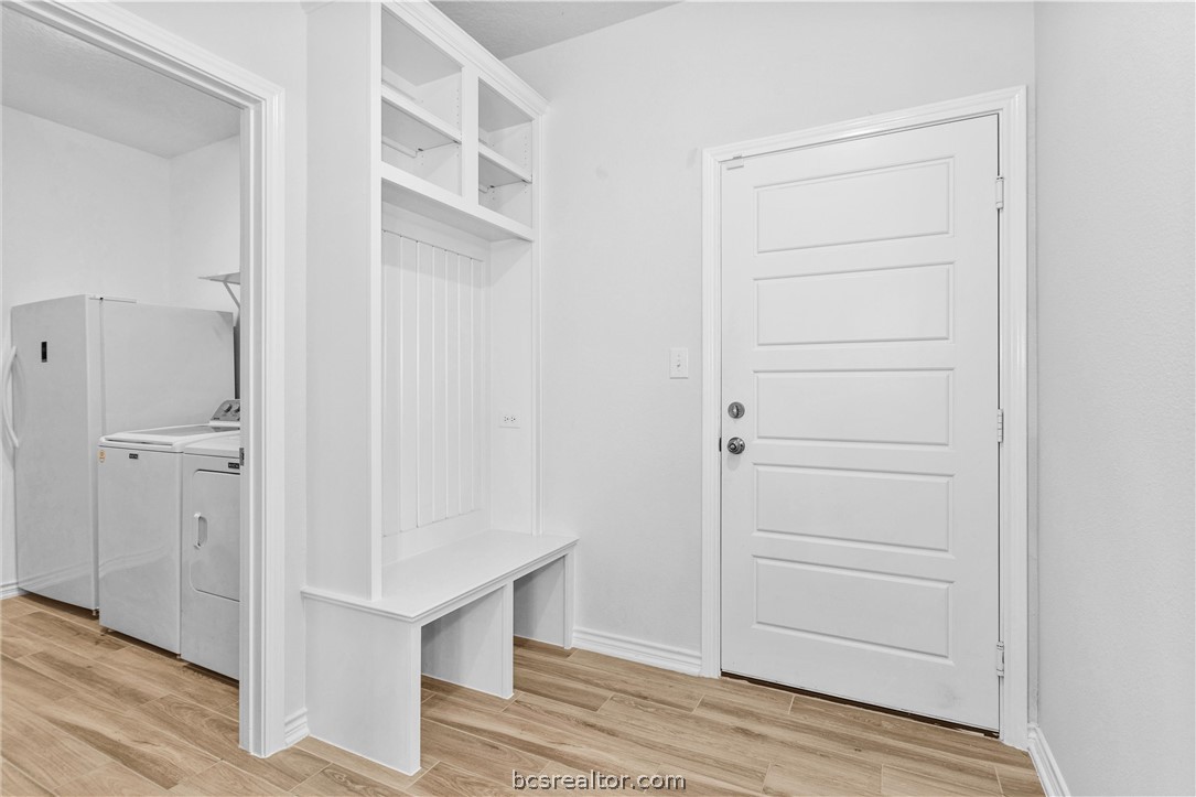 36244 Cochran Road Waller, TX 77484 - Photo 16 of 41 a view of walk in closet with empty racks