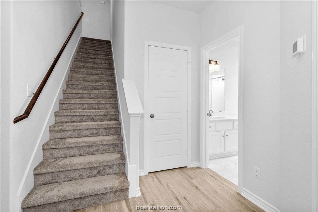 36244 Cochran Road Waller, TX 77484 - Photo 27 of 41 a view of a hallway with wooden floor and entryway