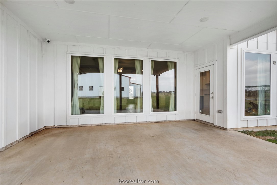 36244 Cochran Road Waller, TX 77484 - Photo 33 of 41 a view of an empty room with glass door and balcony