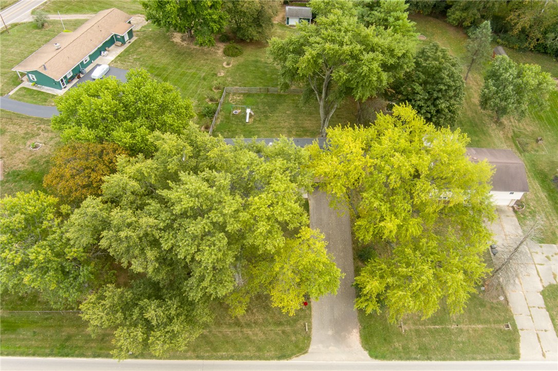 6950 Red Lion 5 Points Road Springboro, OH 45066 - Photo 77 of 78 This verdant property features a long driveway leading to a secluded home amidst lush foliage.