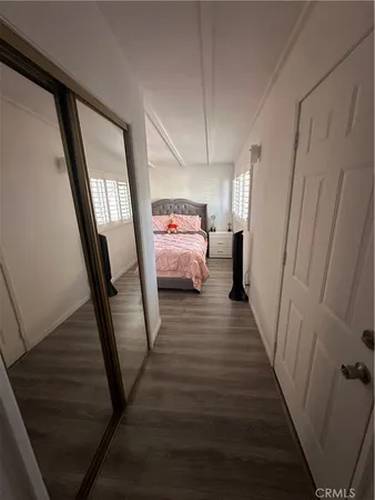 a view of a hallway view with staircase