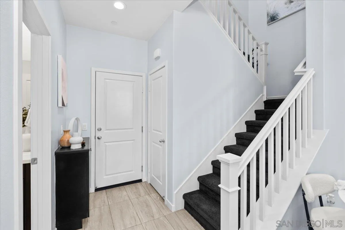 4132 Palomar Way Oceanside, CA 92057 - Photo 15 of 30 a view of entryway with wooden floor and stairs