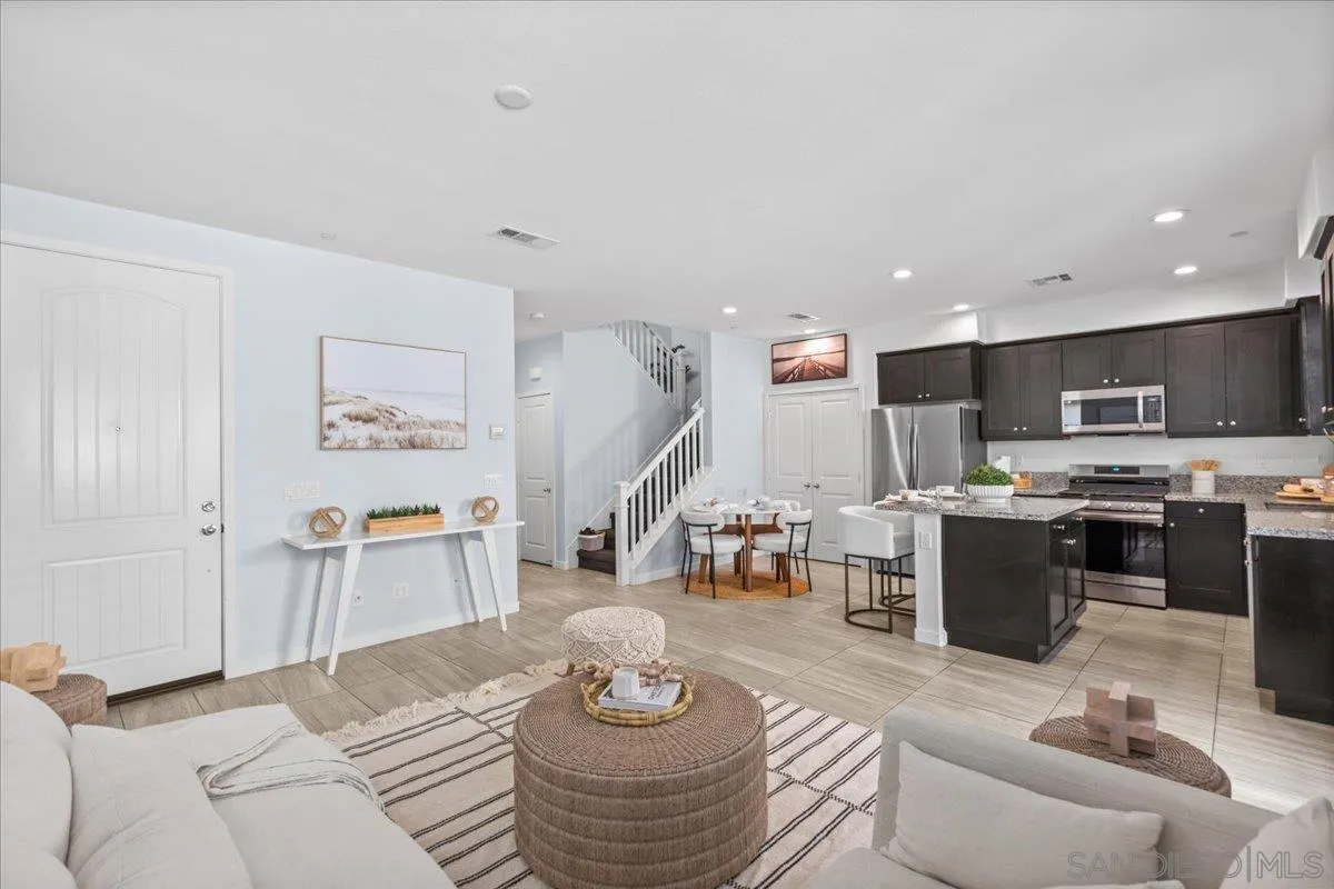4132 Palomar Way Oceanside, CA 92057 - Photo 22 of 30 a living room with furniture and kitchen view