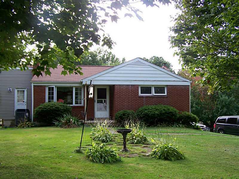 319 Lewis Road Greensburg, PA 15601 - Photo 21 of 21 Exterior Front. View of the front of the house, showing the addition to the left of the diningroom