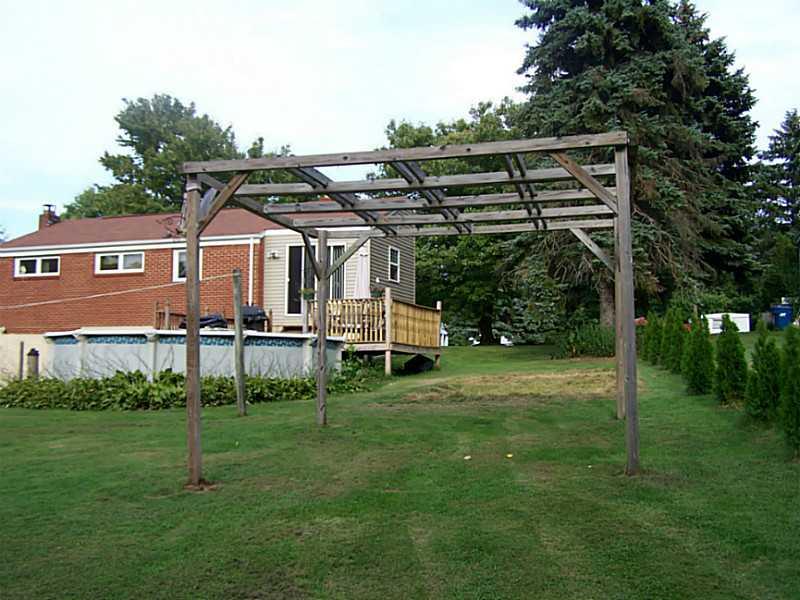 319 Lewis Road Greensburg, PA 15601 - Photo 10 of 21 Exterior Back. View of above ground pool, & back of house