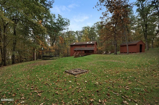 3630 South Massbach Road Stockton, IL 61085 - Photo 18 of 25 a view of a backyard with large trees