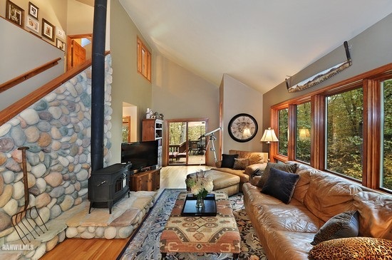 3630 South Massbach Road Stockton, IL 61085 - Photo 3 of 25 a living room with furniture a table and a large window