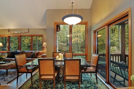 3630 South Massbach Road Stockton, IL 61085 - Photo 5 of 25 a dining room with furniture a chandelier and wooden floor