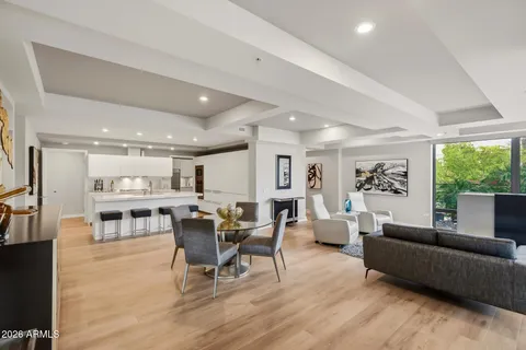 a kitchen with sink and cabinets