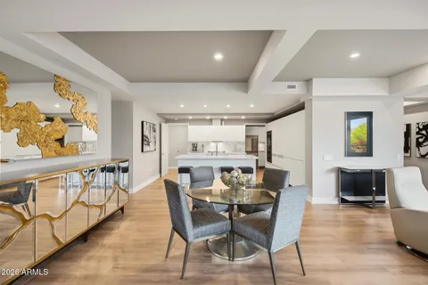 a view of a living room and dining room