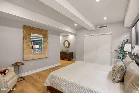 a bathroom with a double vanity sink and mirror