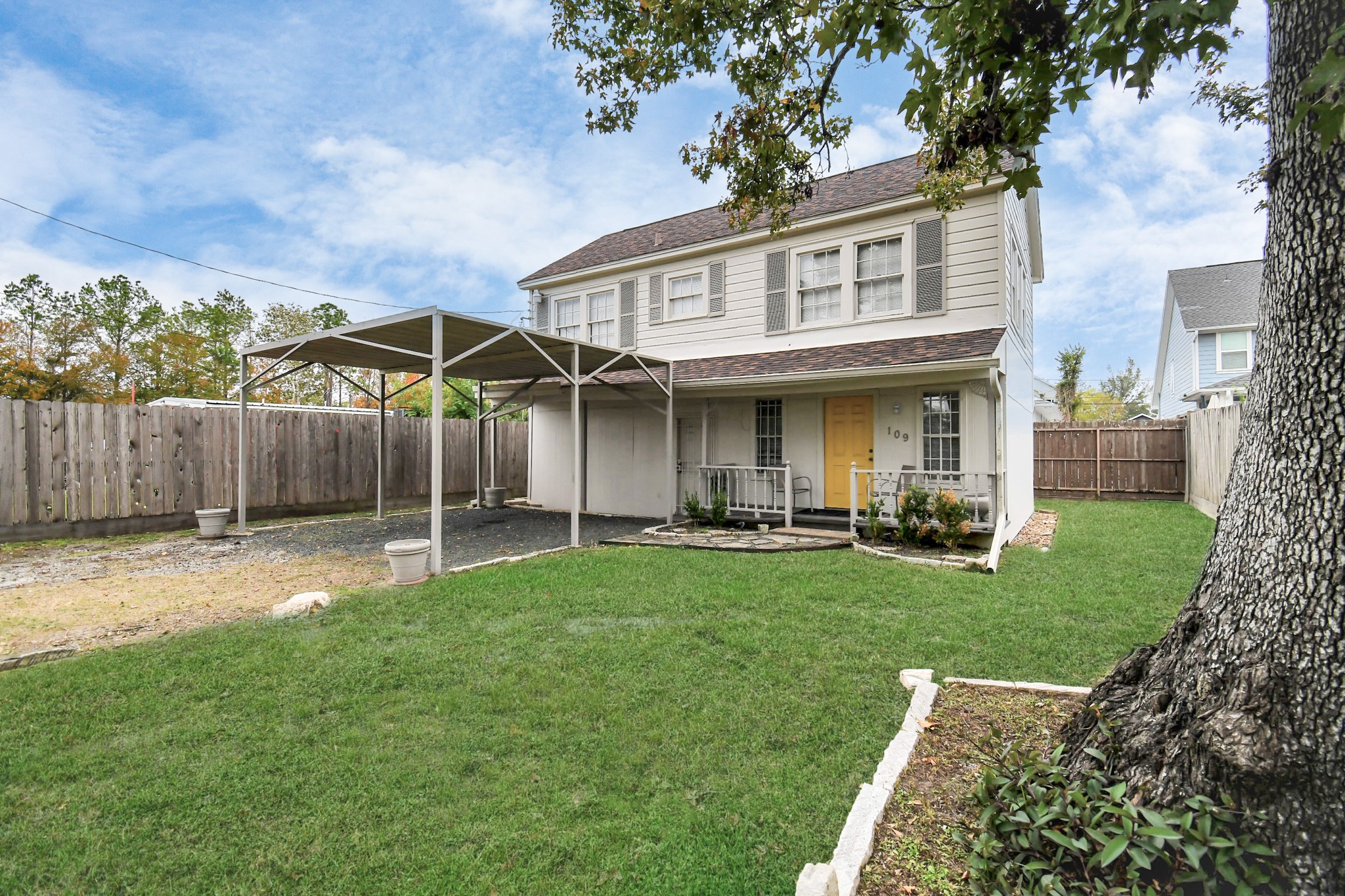 109 Amundsen Street Houston, TX 77009 - Photo 27 of 40 a view of a house with a yard and sitting area