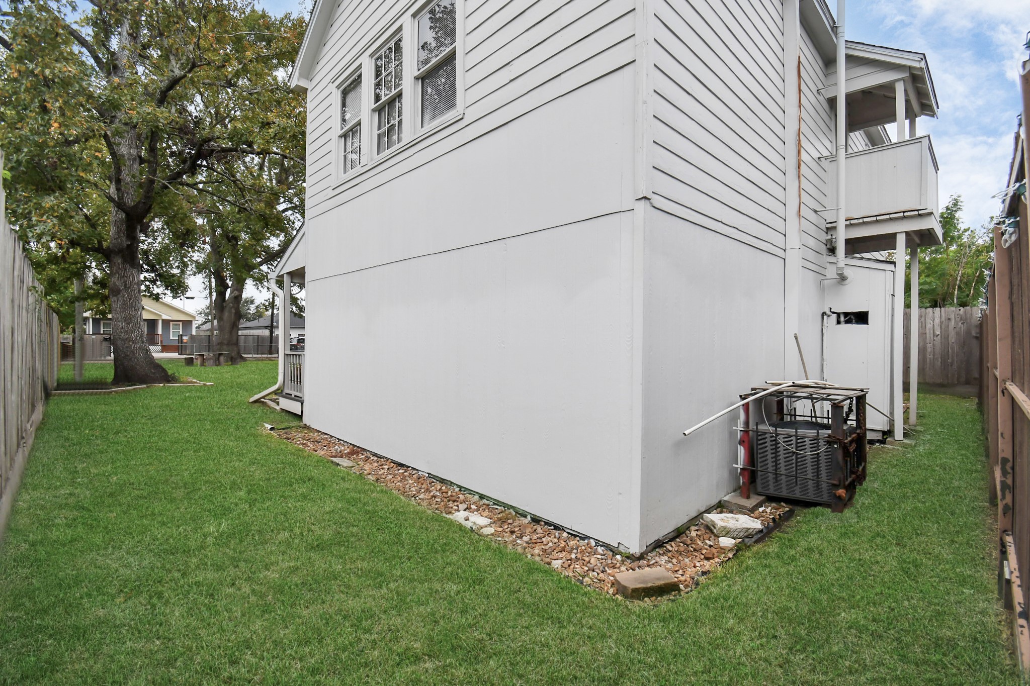 109 Amundsen Street Houston, TX 77009 - Photo 30 of 40 a view of backyard with barbeque grill and a small yard
