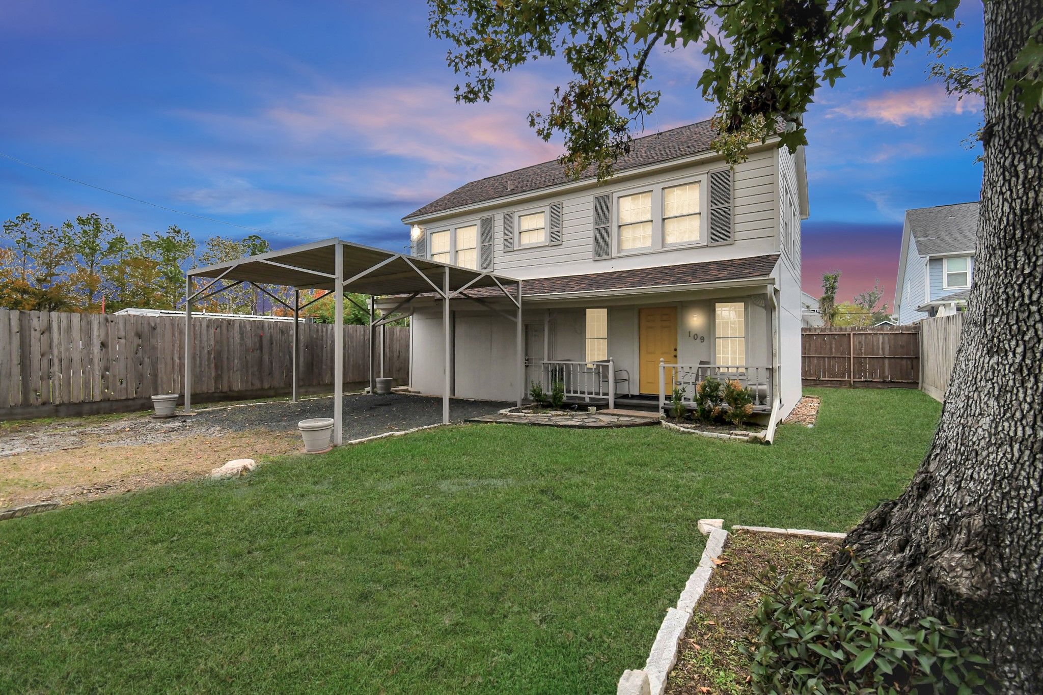 109 Amundsen Street Houston, TX 77009 - Photo 34 of 40 a view of a house with a yard and sitting area