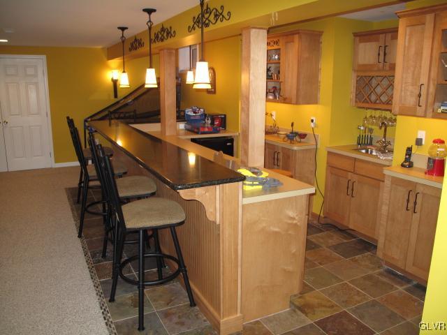 3140 Muirfield Road Center Valley, PA 18034 - Photo 12 of 14 Finished basement wet bar with tile floor.