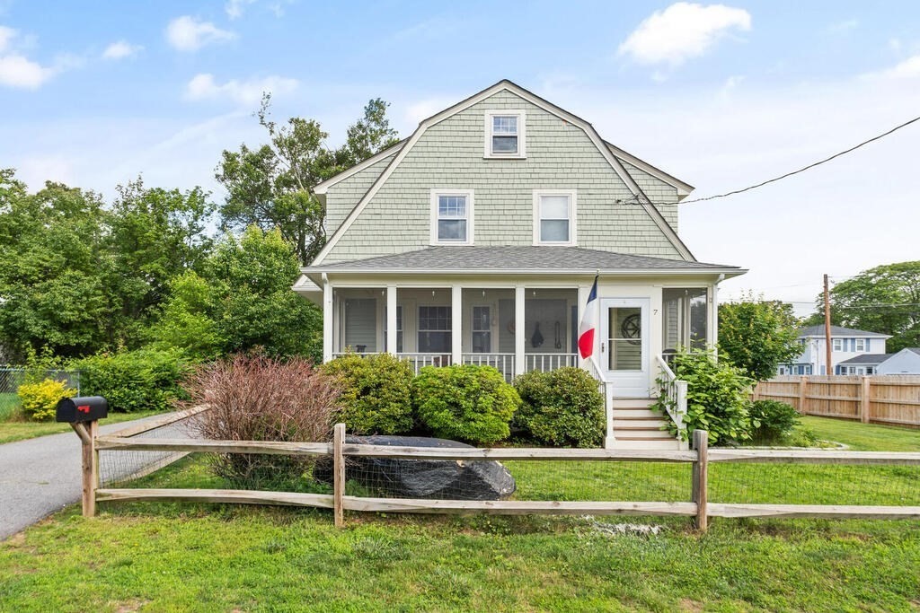 7 Charles Street Maynard, MA 01754 - Photo 1 of 33 a front view of a house with a yard