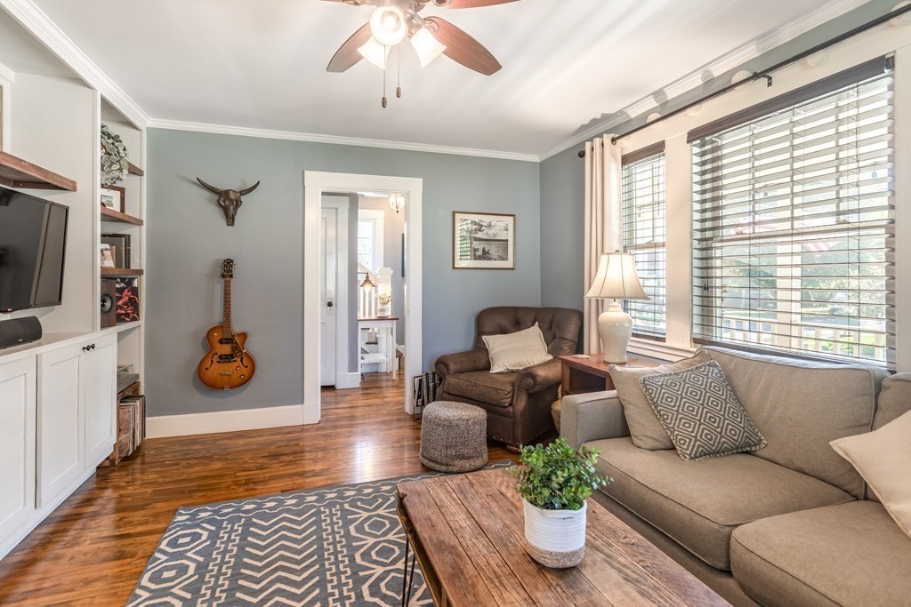 7 Charles Street Maynard, MA 01754 - Photo 11 of 33 a living room with patio furniture and a window