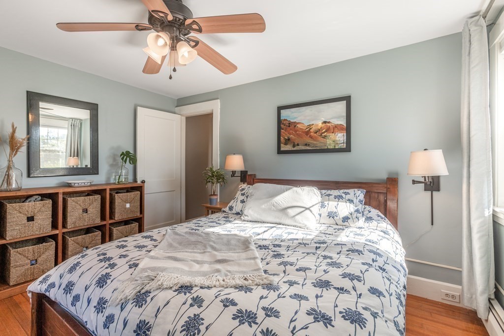 7 Charles Street Maynard, MA 01754 - Photo 21 of 33 a bedroom with a bed and a dresser