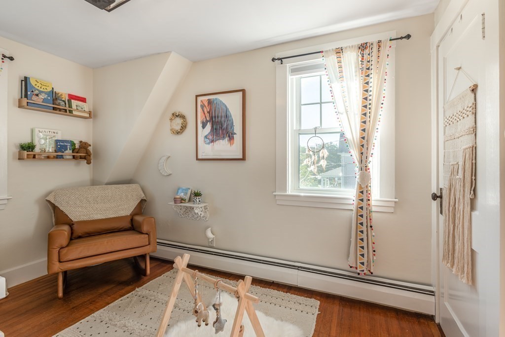 7 Charles Street Maynard, MA 01754 - Photo 23 of 33 a bathroom with a window and a shower