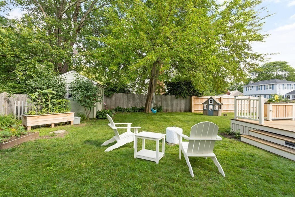 7 Charles Street Maynard, MA 01754 - Photo 29 of 33 a view of a table and chairs in the patio